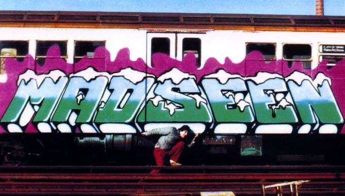 MAD SEEN graffiti on a New York City subway car, circa 1980. Graffiti: SEEN.